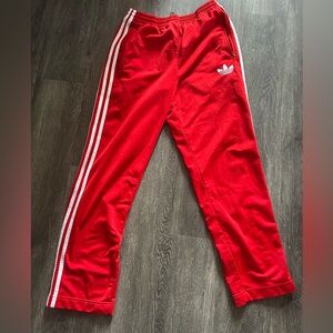 ADIDAS men’s jogger pants in red
Size small